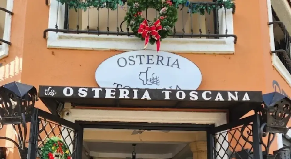 Letrero de Osteria Toscana